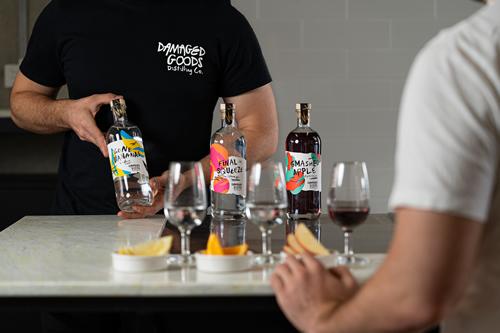 A tasting flight being poured at the Damaged Goods bar
